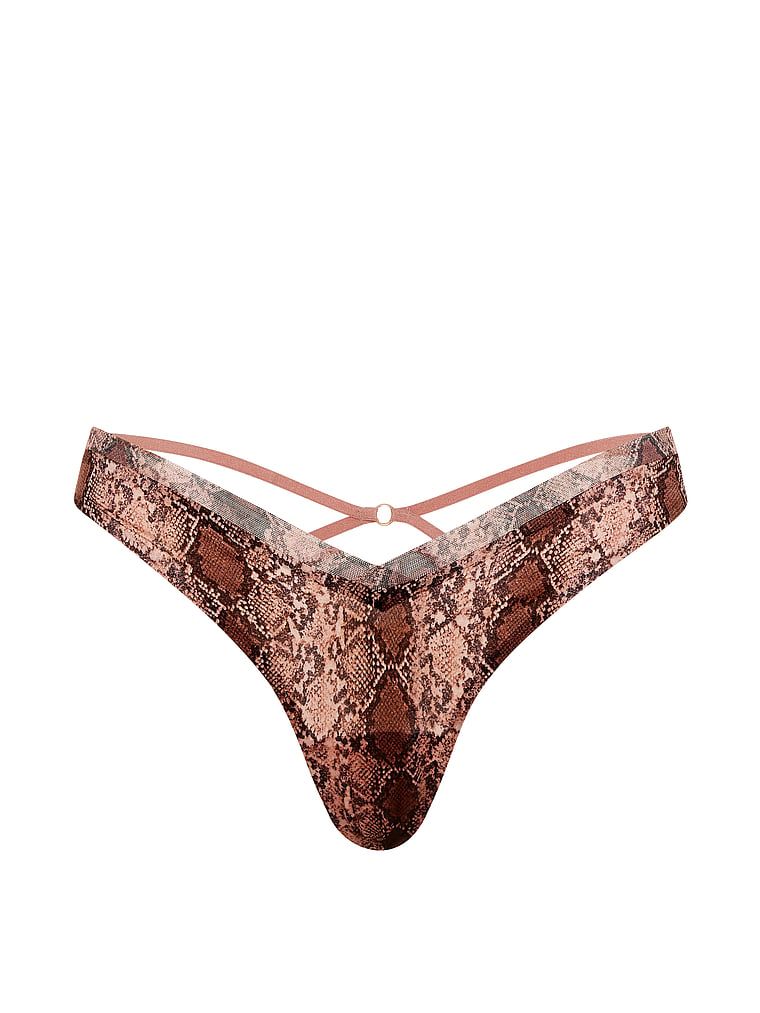 Tanga s naramenicama na leđima Sheer Reveal. Proizvod ima uzorkovane boje i dolazi iz kolekcije Very Sexy.