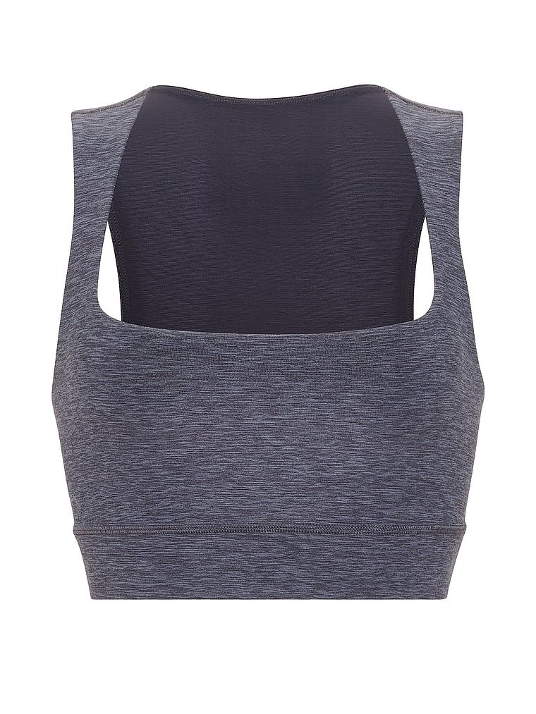 VSX New Essential top sportski grudnjak. Proizvod ima šarene boje i dolazi iz VSX kolekcije.