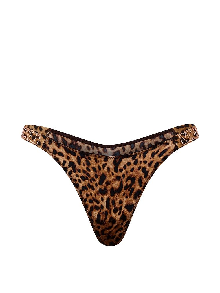 Tange s sjajnim naramenicama za sjaj. Proizvod ima šarene boje i dolazi iz kolekcije Very Sexy.