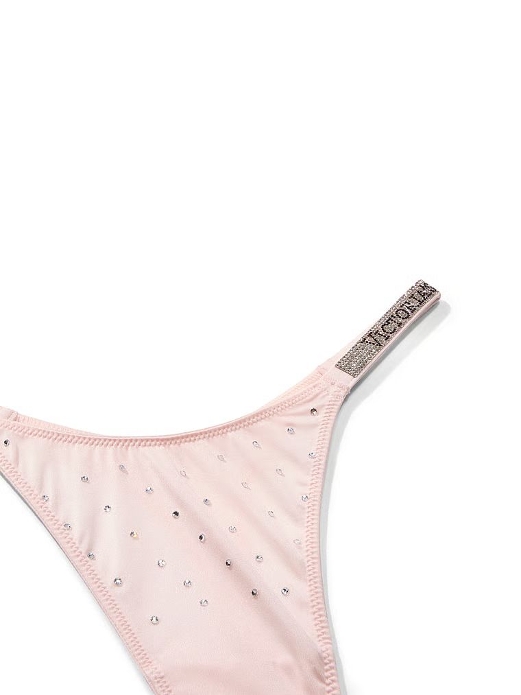 Točkica remena za sjaj tanga. Proizvod je ružičaste boje i dolazi iz kolekcije Very Sexy.