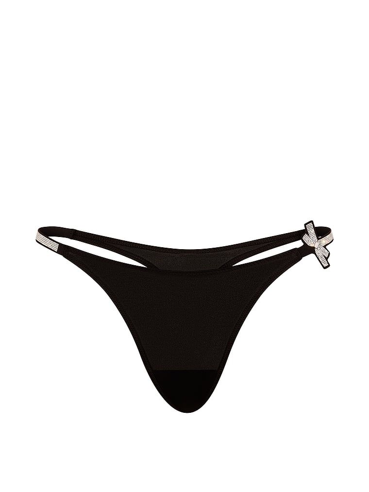 Luk za sjaj tanga. Proizvod je crne boje i dolazi iz kolekcije Very Sexy.
