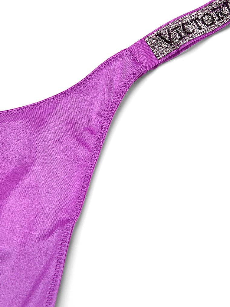 Tange s sjajnim naramenicama za sjaj. Proizvod je ljubičaste boje i dolazi iz kolekcije Very Sexy.
