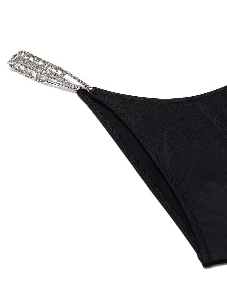 Brazilske gaćice sa sjajnim prugama Shine loga. Proizvod je crn i dolazi iz kolekcije Very Sexy.
