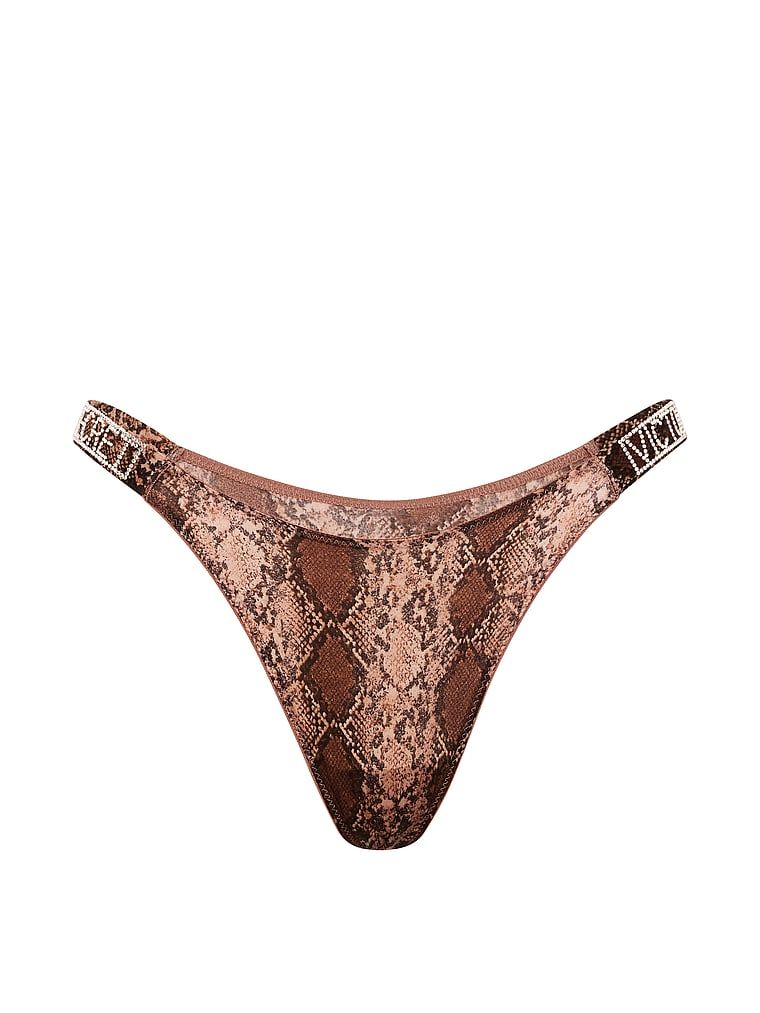 Brazilske čipkaste gaćice s Shine Strap brazilskim prugama. Proizvod ima uzorkovane boje i dolazi iz kolekcije Very Sexy.