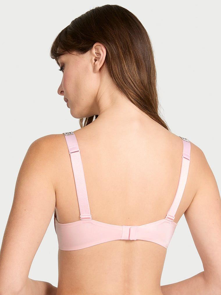 Blago podstavljeni grudnjak s Shine Strap Demi sjajnim naramenicama. Proizvod je ružičaste boje i dolazi iz kolekcije Very Sexy.