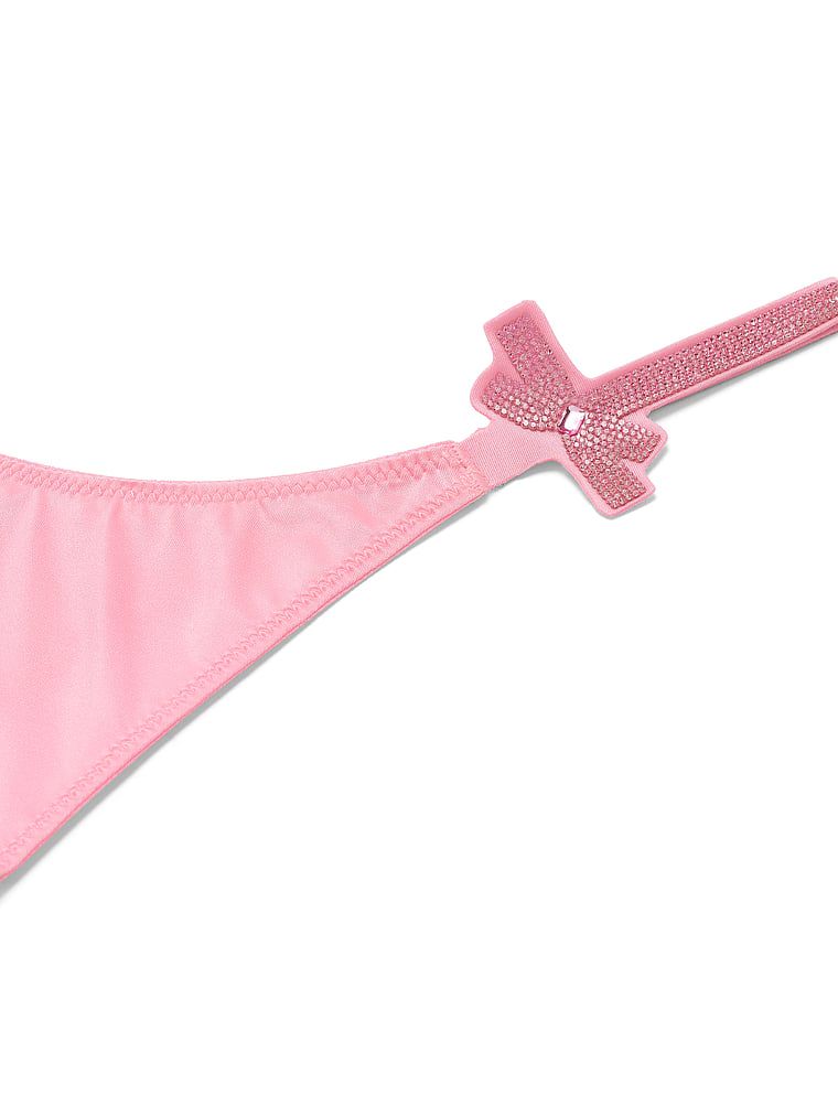 Luk za sjaj tanga. Proizvod je ružičaste boje i dolazi iz kolekcije Very Sexy.