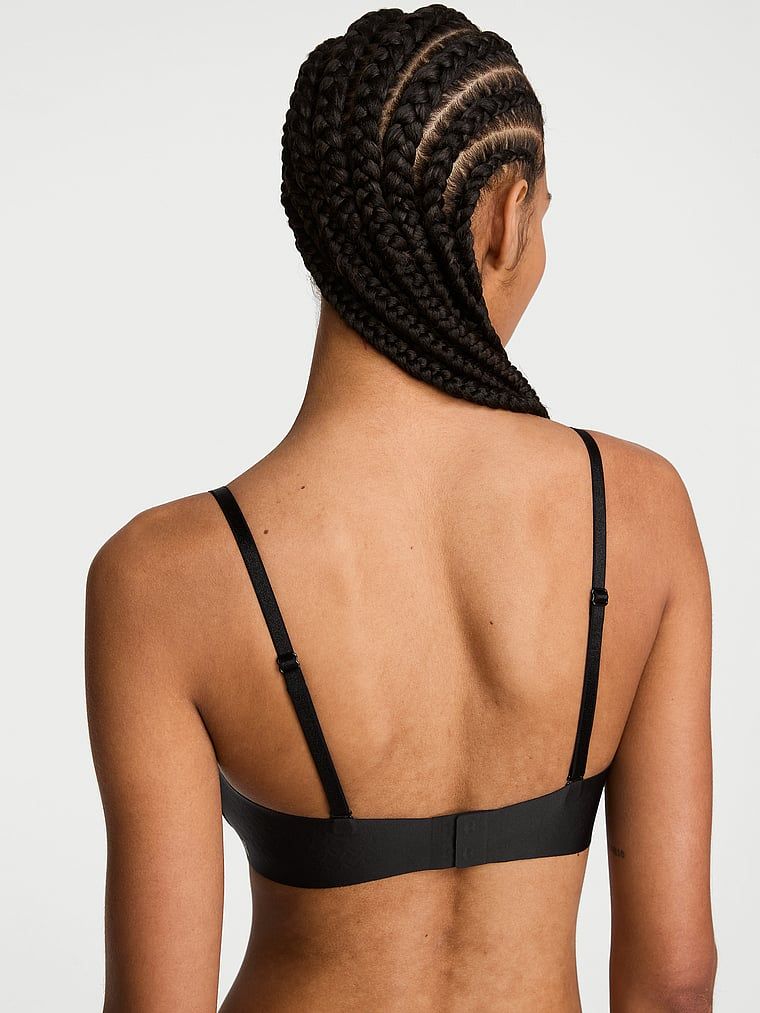 Uplift grudnjak bez naramenica za push-up. Proizvod je crn i dolazi iz kolekcije Invisible by Victoria's Secret.