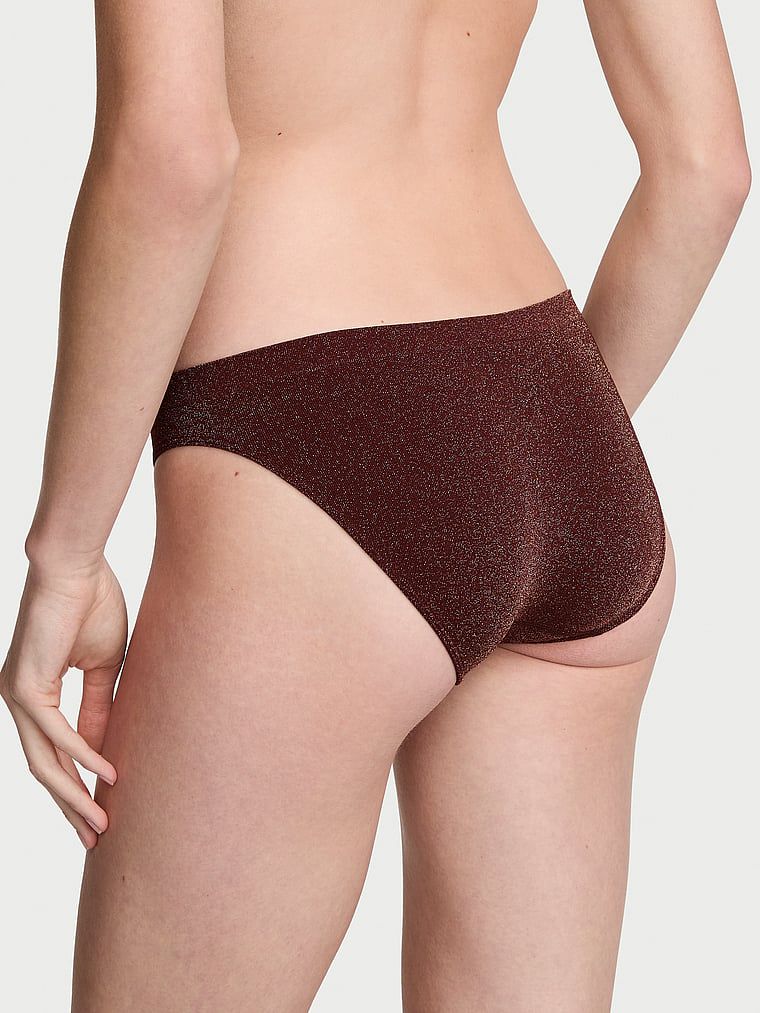 Sjajne bikini gaćice. Proizvod je smeđe boje i dolazi iz kolekcije Seamless.