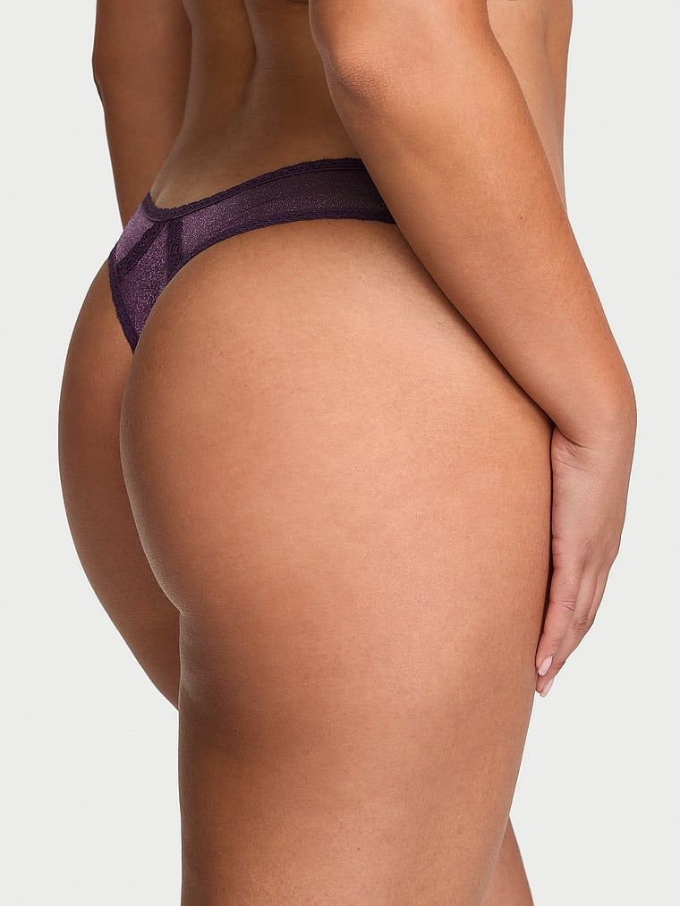Sheer Shimmer Shimmer Shiny Thong. Proizvod je ljubičaste boje i dolazi iz kolekcije Dream Angels.
